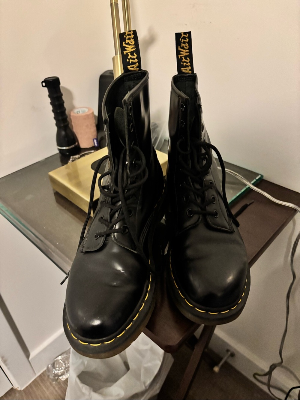 Dr. Martens 1460 boots feature the iconic yellow welt stitching size 8/8.5